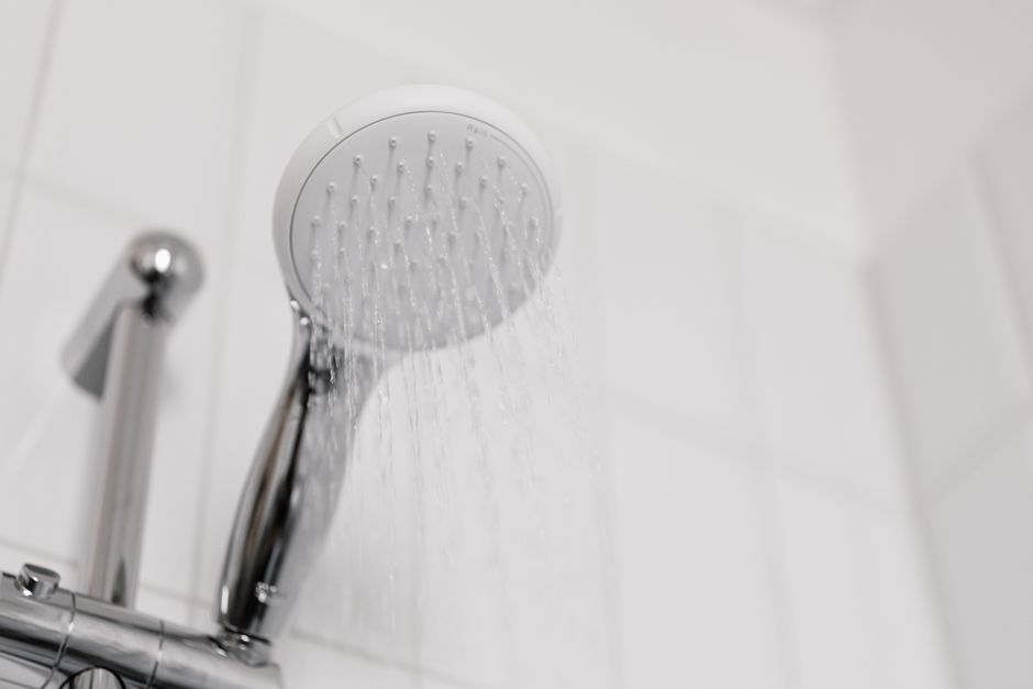 Rainfall shower head in a walk-in shower